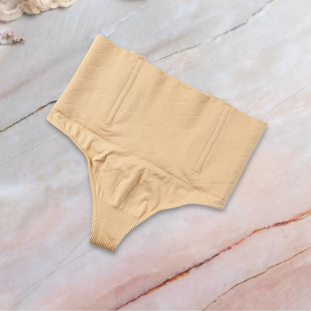 in colour sand slay the waist thong shapewear on marble surface
